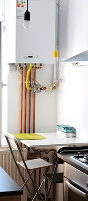 view of small boiler in kitchen